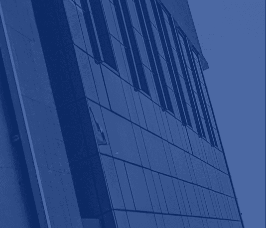 A cooperative banking building facade with a blue overlay